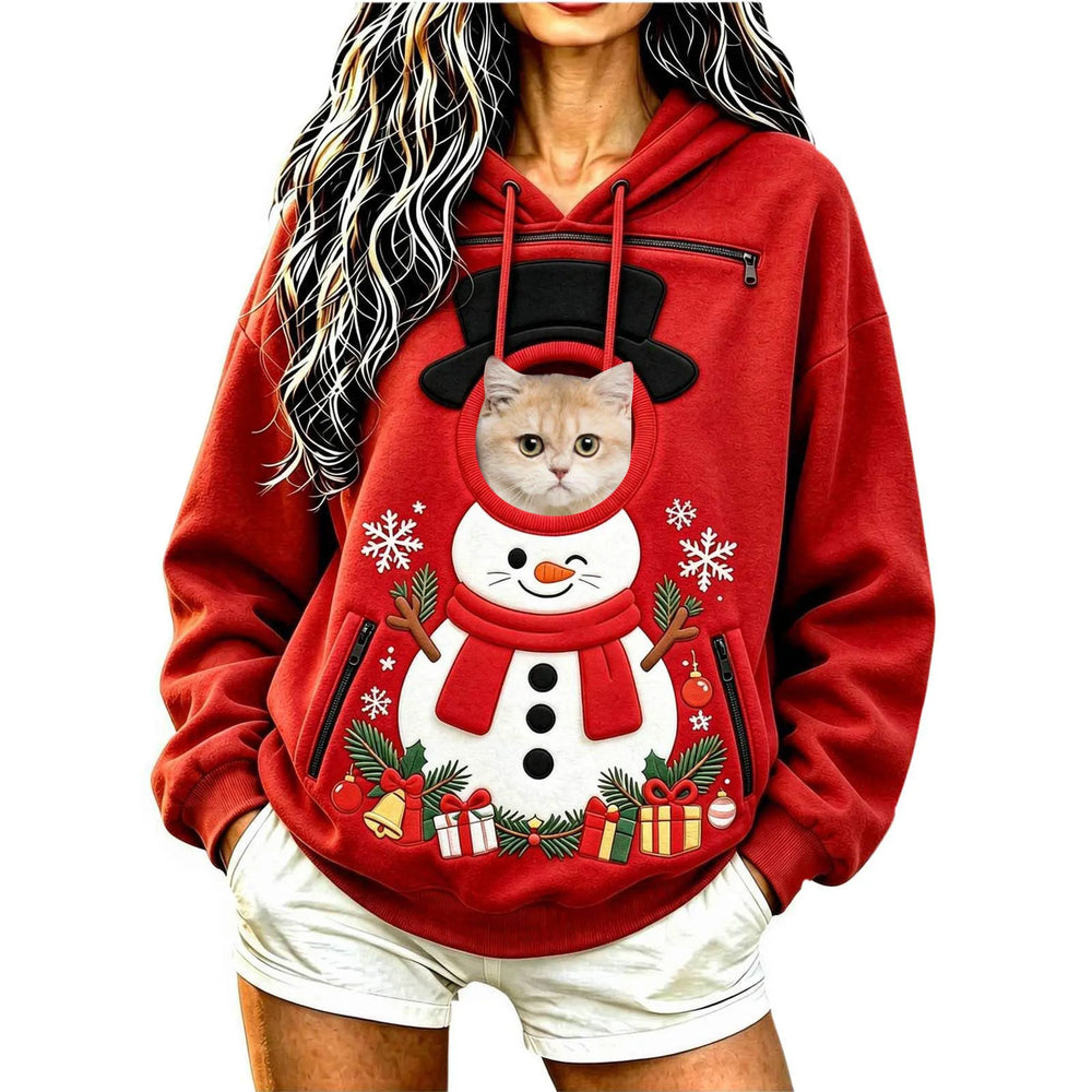 Cat peeking out of the Snowman pet pocket Christmas hoodie
