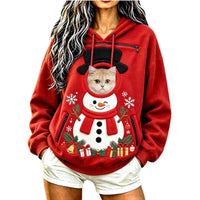 Cat peeking out of the Snowman pet pocket Christmas hoodie